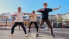 A Tai chi instructor teaches amputees different poses