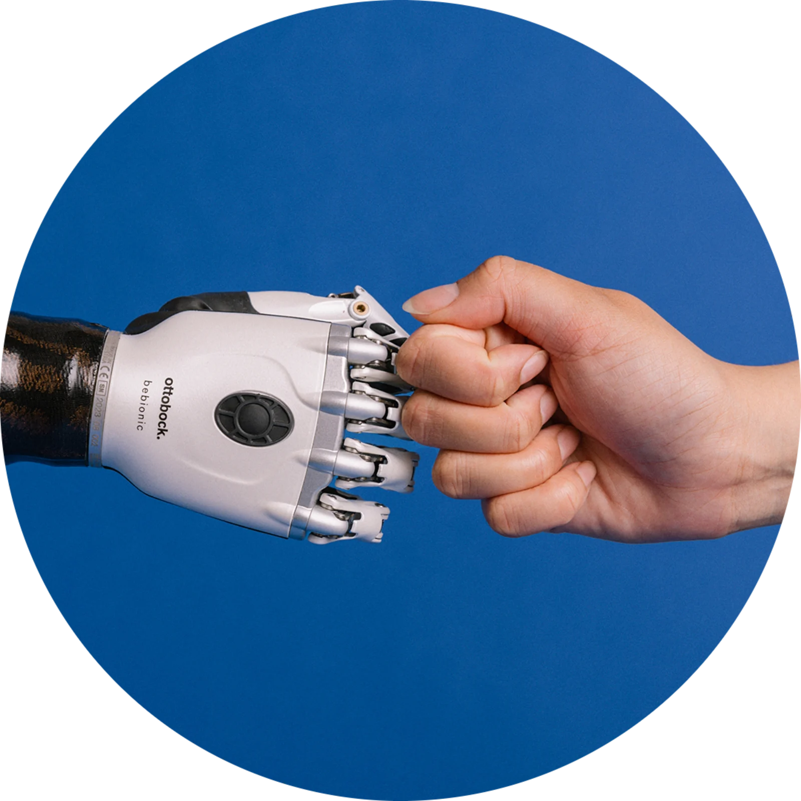 a bebionic multi-grip prosthetic hand first bumping a natural hand