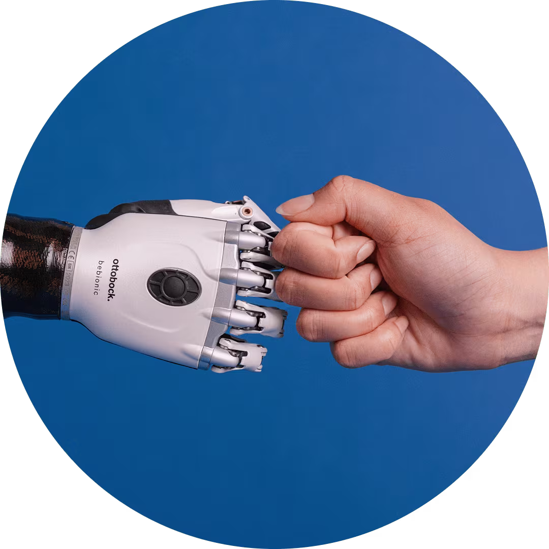 a bebionic multi-grip prosthetic hand first bumping a natural hand
