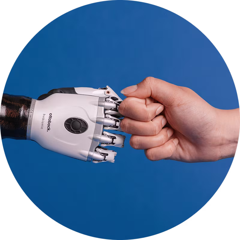 a bebionic multi-grip prosthetic hand first bumping a natural hand