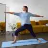 A female user doing yoga with her Ottobock Evanto prosthetic foot.