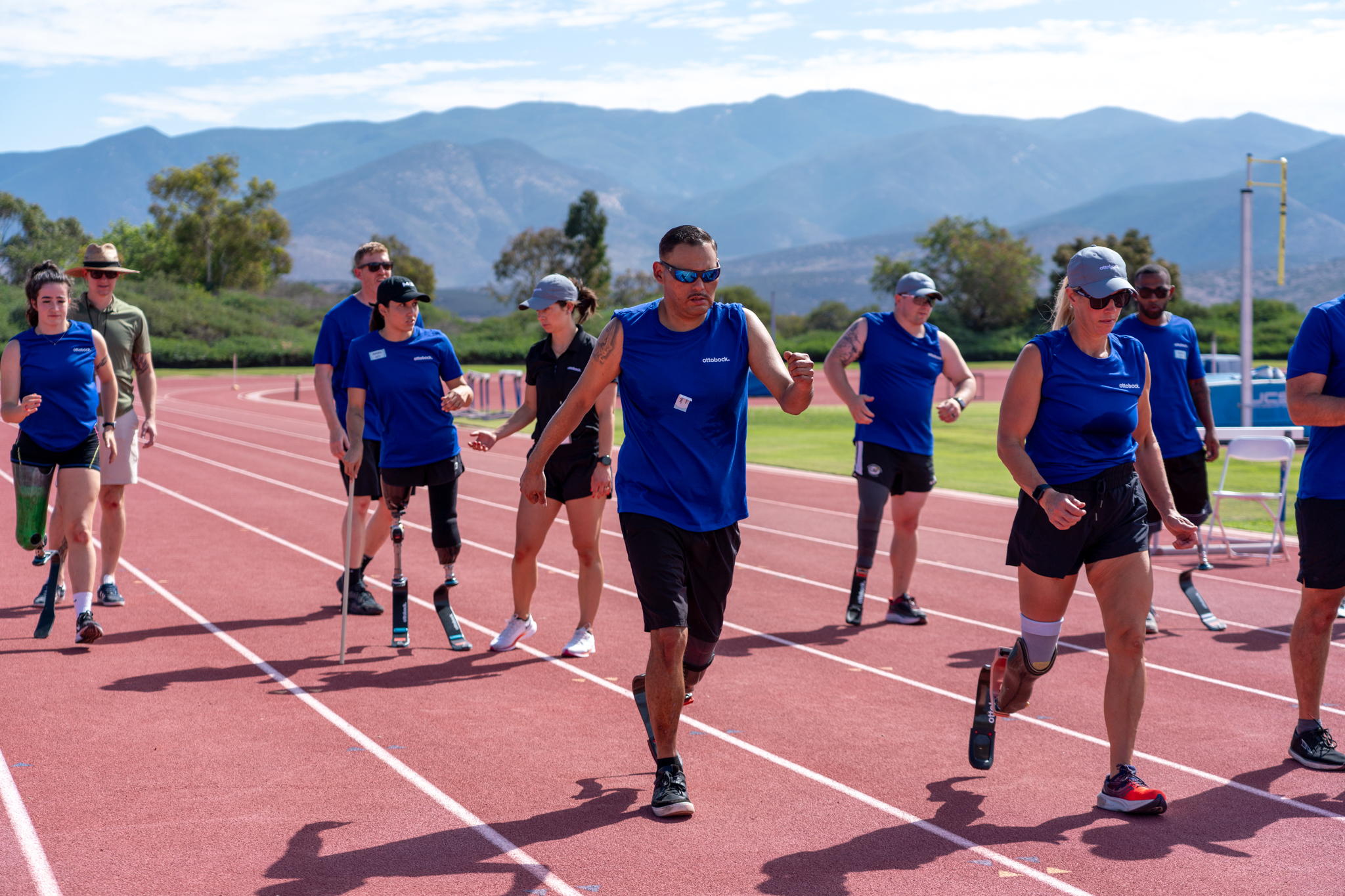 A prosthetic leg user wearing an Ottobock runner artificial leg on an outdoor track