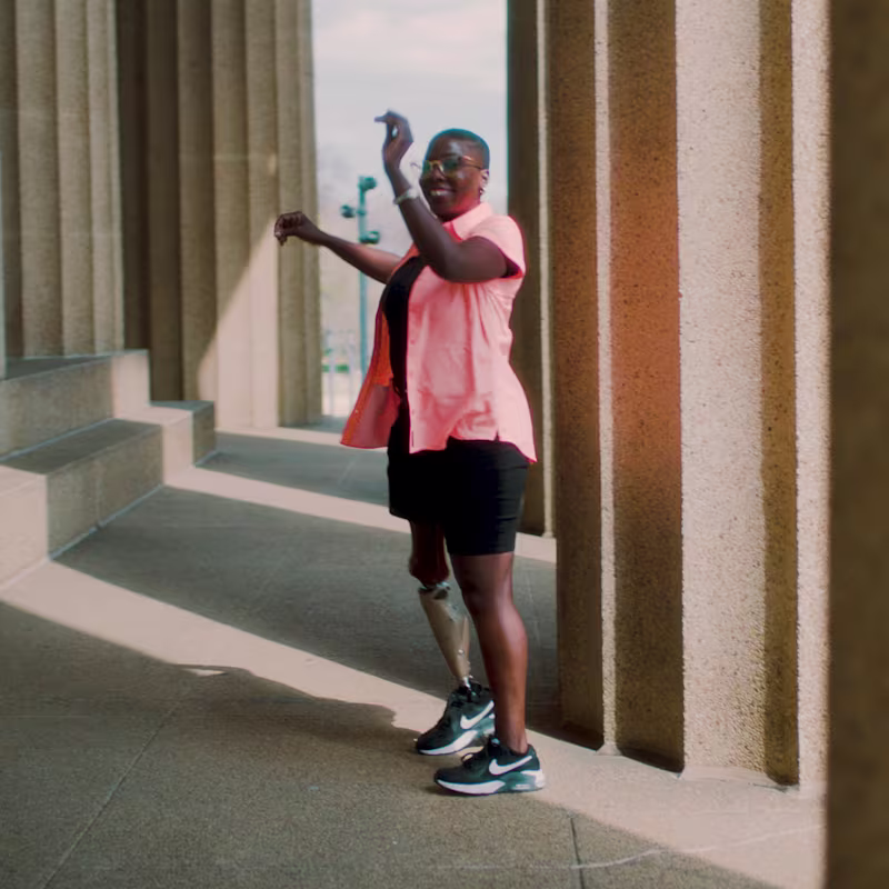 Royal stands outside wearing her C-Leg 4 Microprocessor Knee