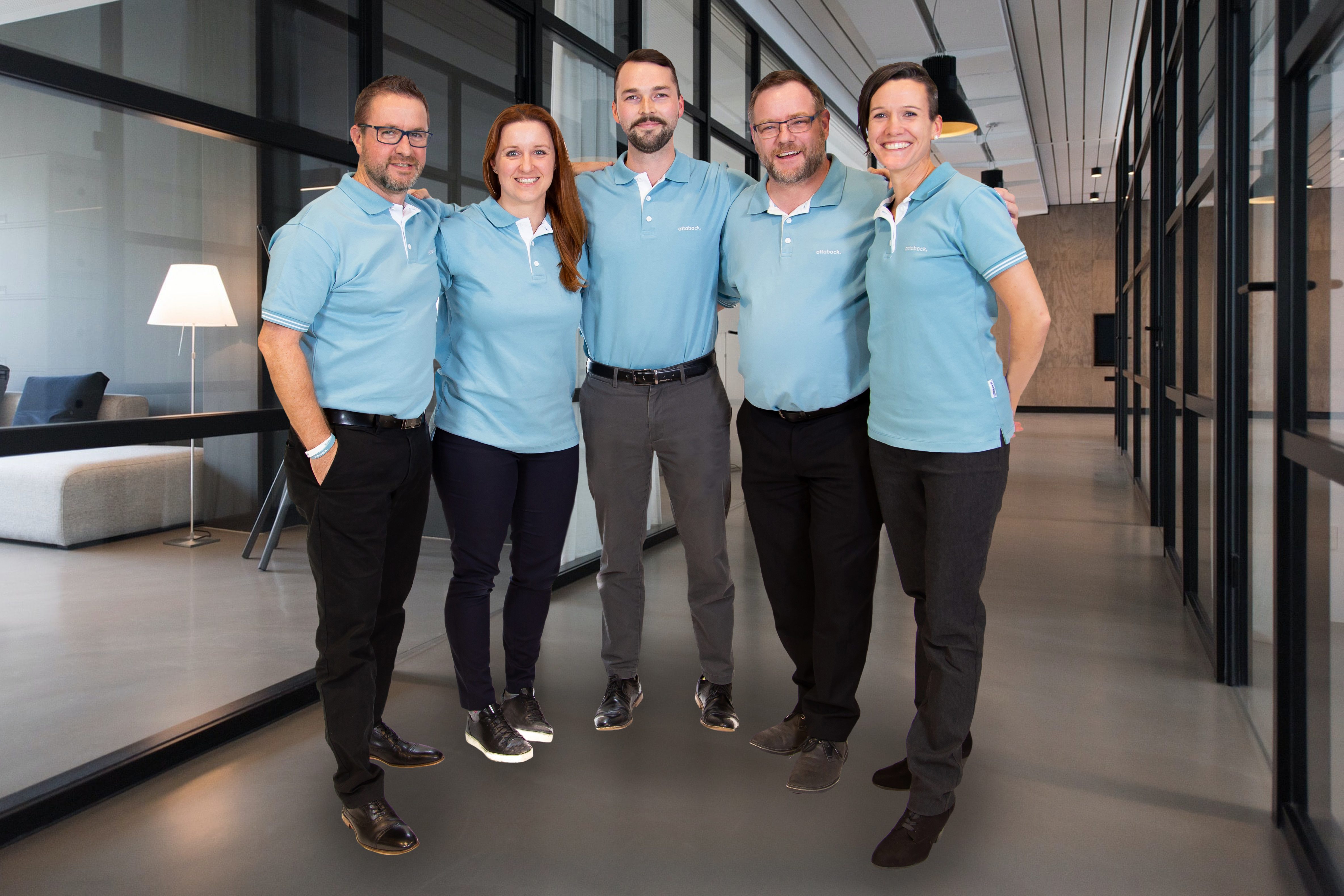 A professional standing in front of a white board