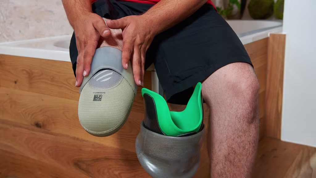 Close-up of a user rolling up a Caleo liner.