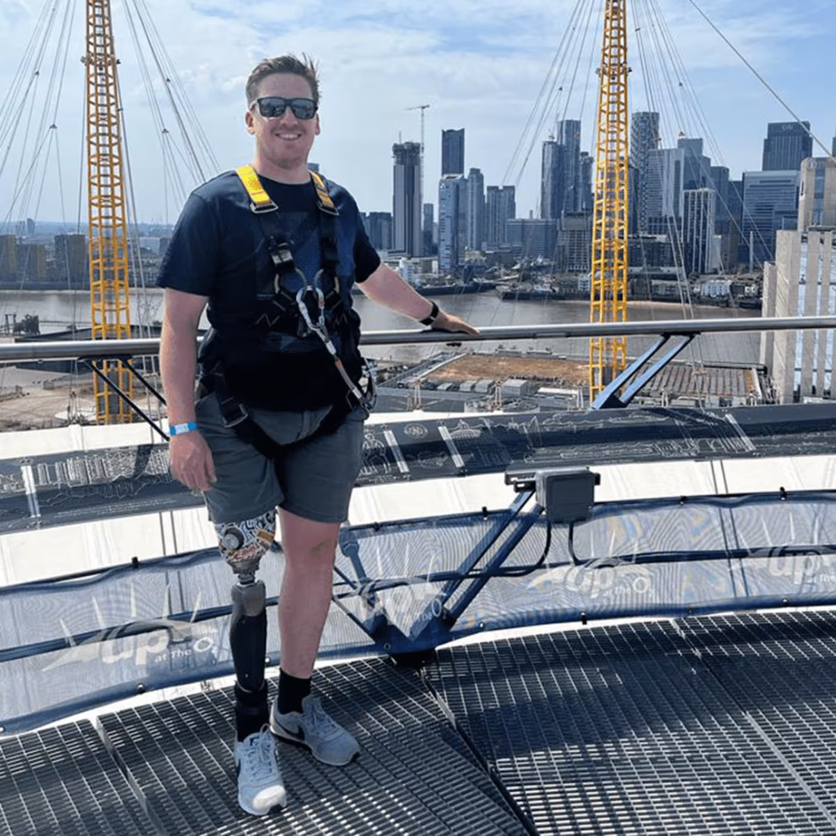 Dave W standing on top of the O2 Arena in London with his C-Leg Microprocessor Knee from Ottobock