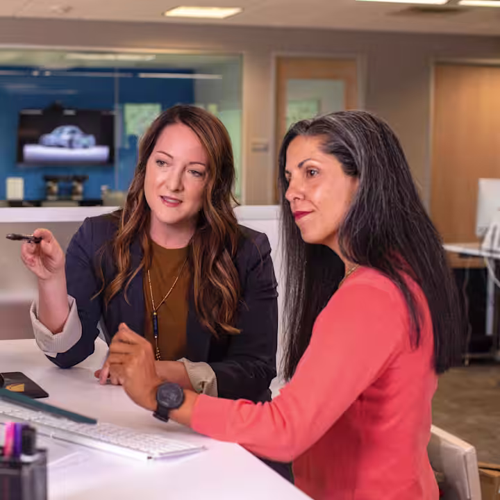 Two peers meeting in an office