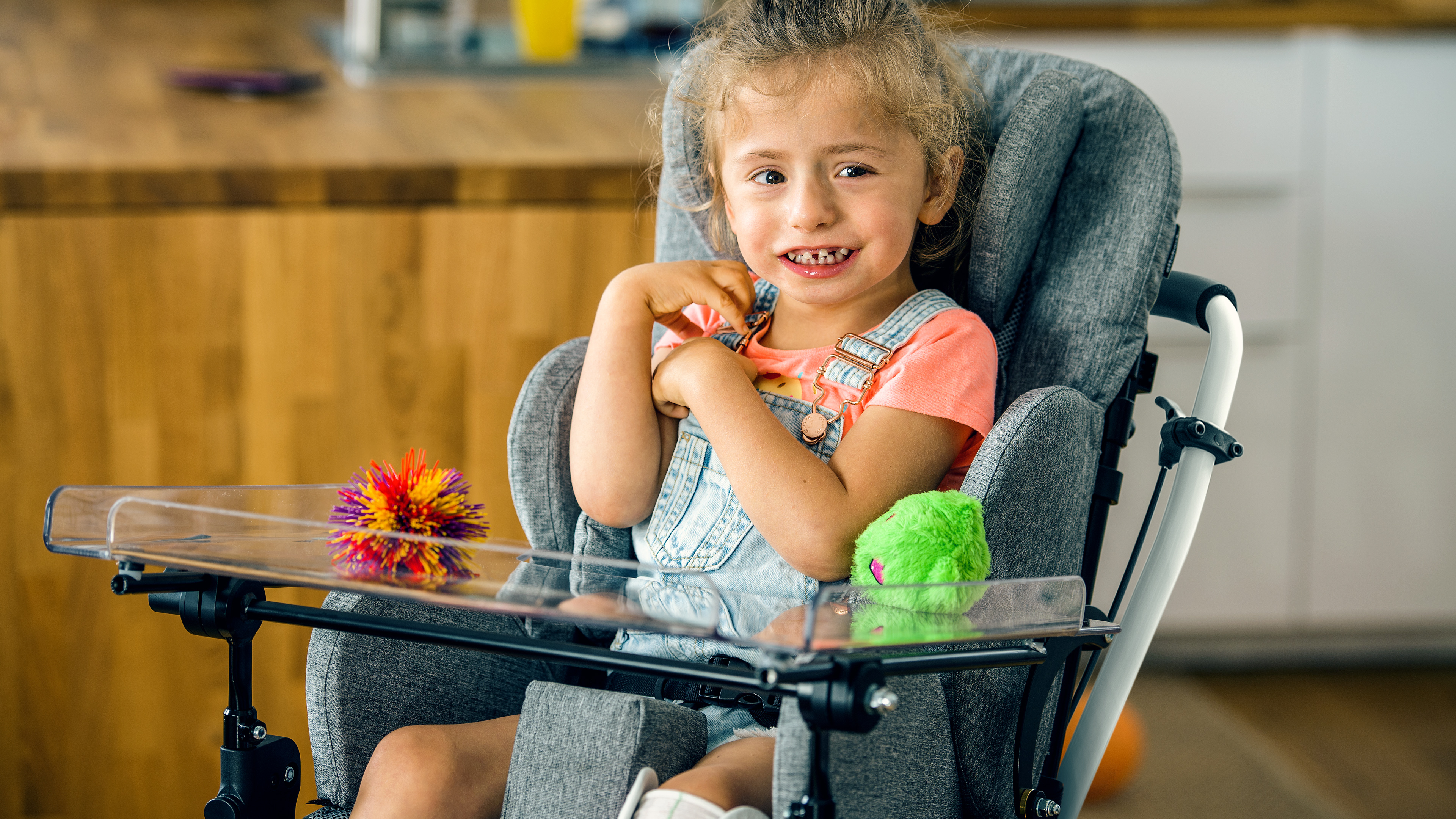 Emilia is sitting in her Kimba buggy