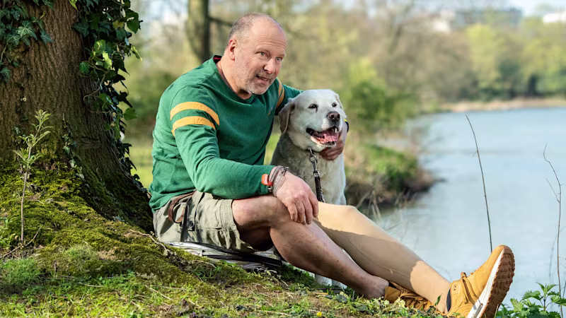 Genium-Anwender Axel mit seinem Hund
