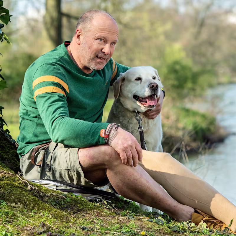 Genium-Anwender Axel mit seinem Hund