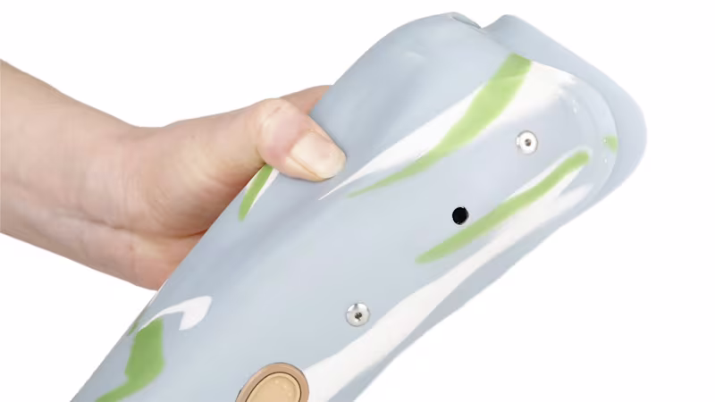 A person pressing into a flexible SiOCX upper limb socket