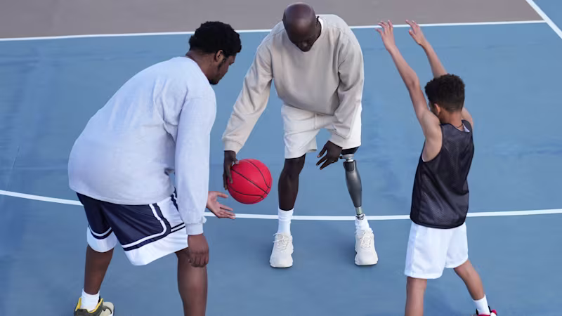 Genium X4 user Marcus is playing basketball with his sons