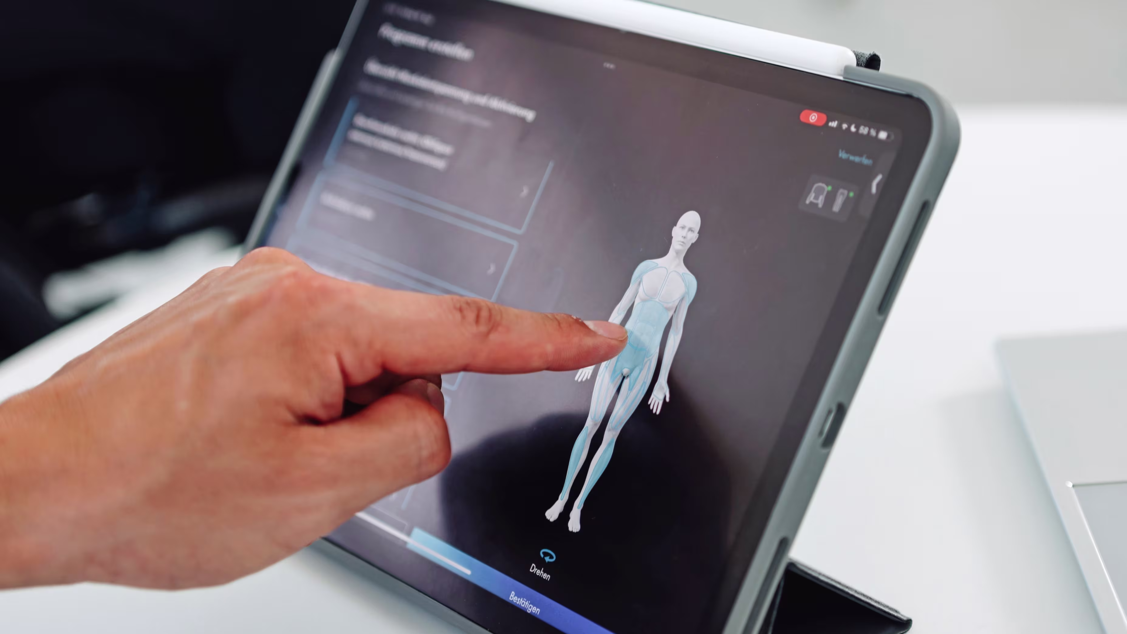 exopulse suit user Ricky is checking the exopulse app on his phone.