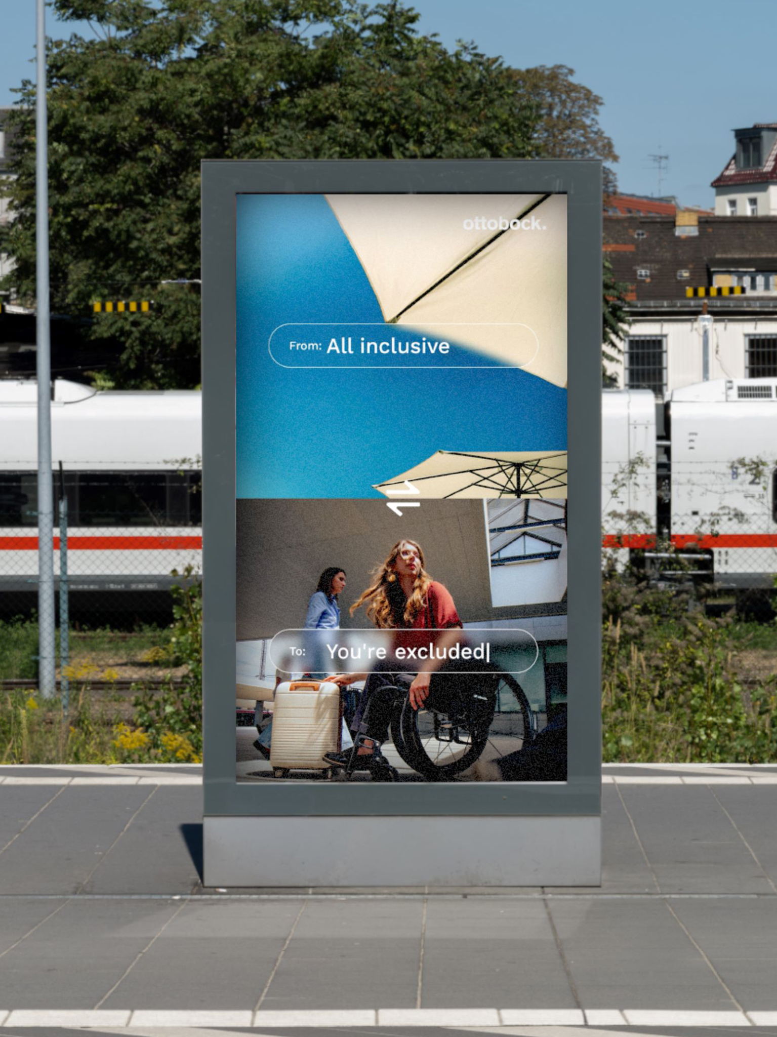 Train station ad showing a beach scene above and a woman using a wheelchair below, illustrating the gap between vacation promises and accessibility realities.