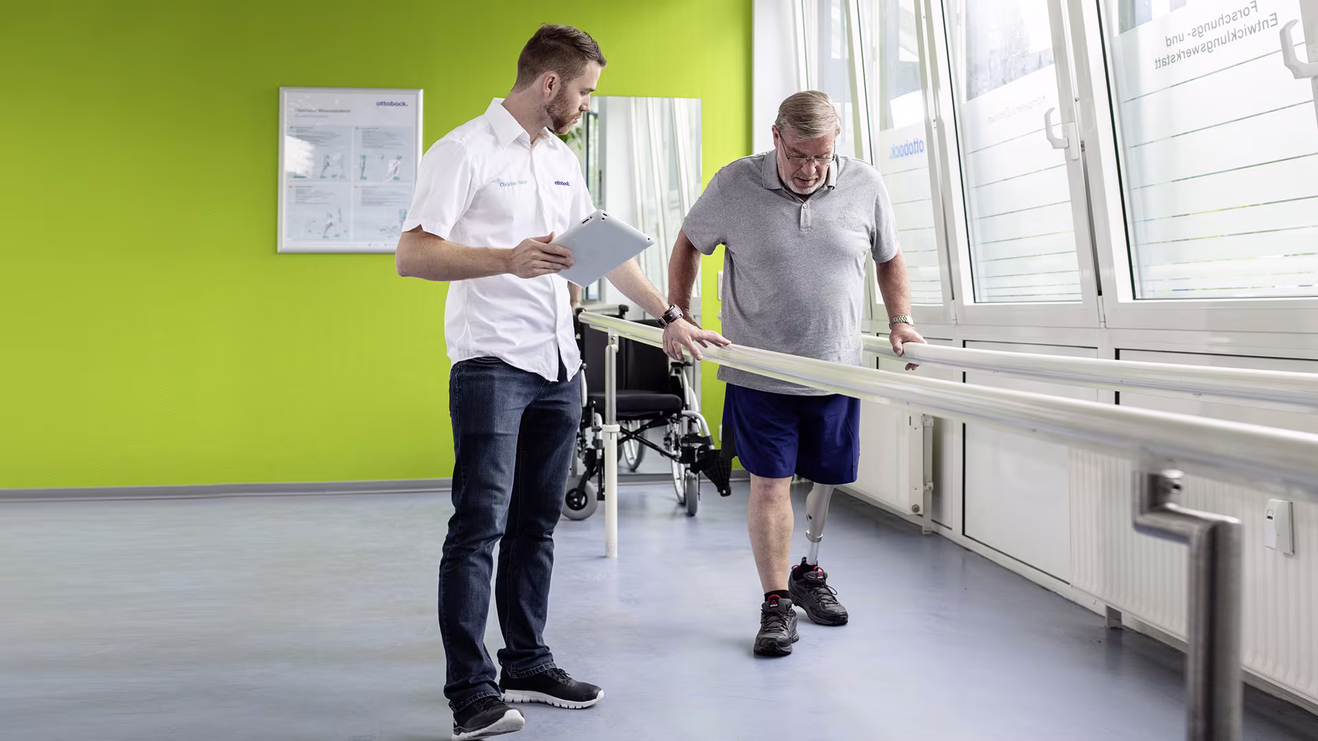 An O&P professional aids an amputee during their trial of a bionic foot 