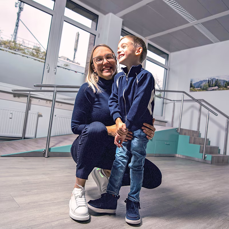 Cerebral palsy patient with his mother