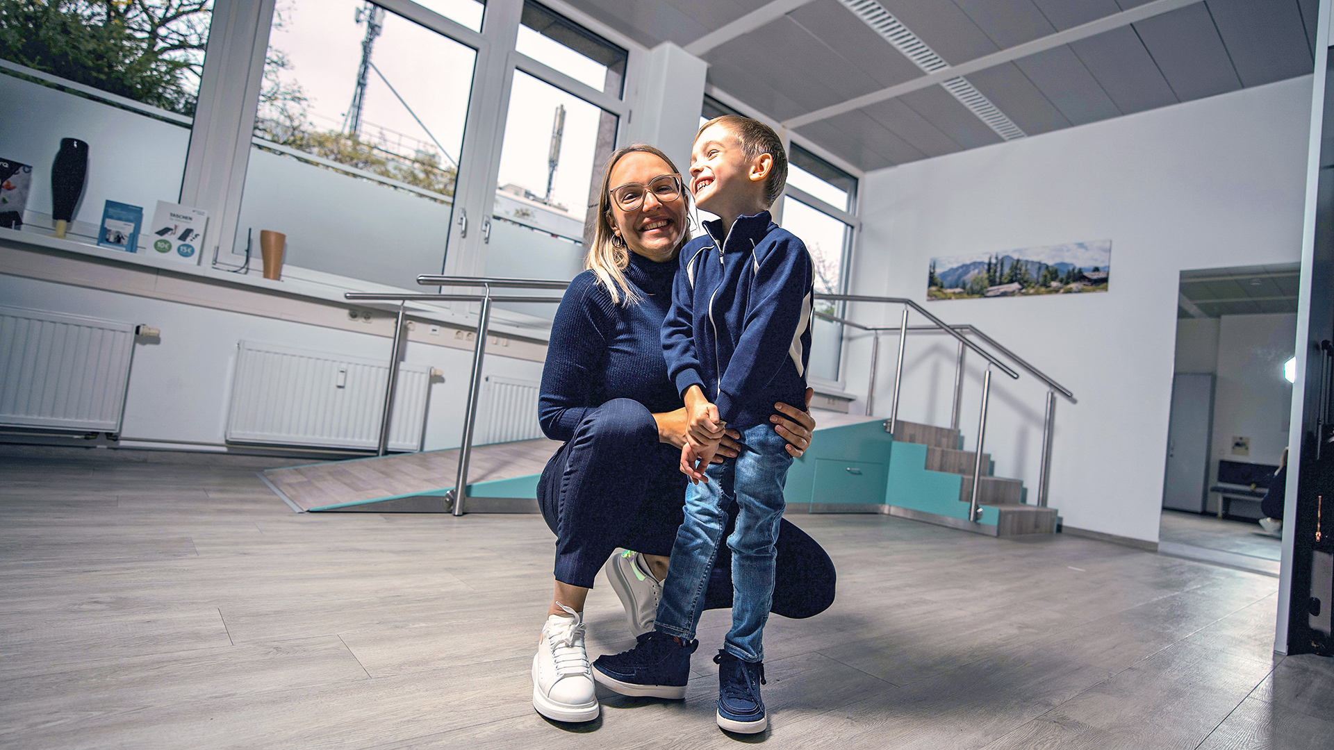 Zerebralparese Patient mit seiner Mutter