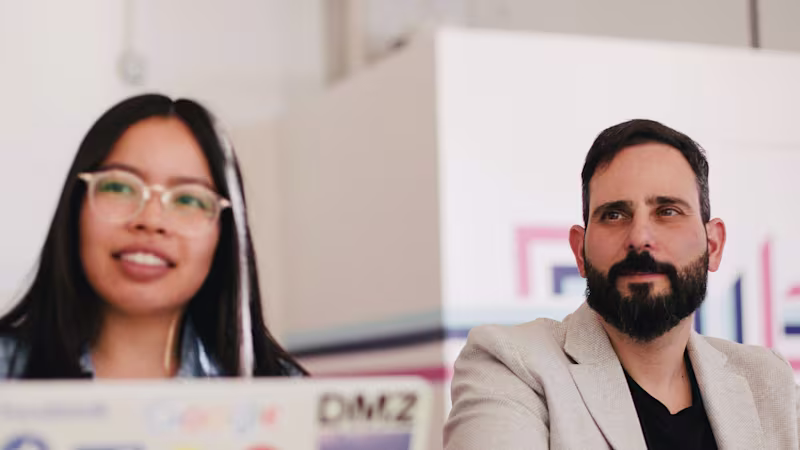 Two professional colleagues in an office meeting