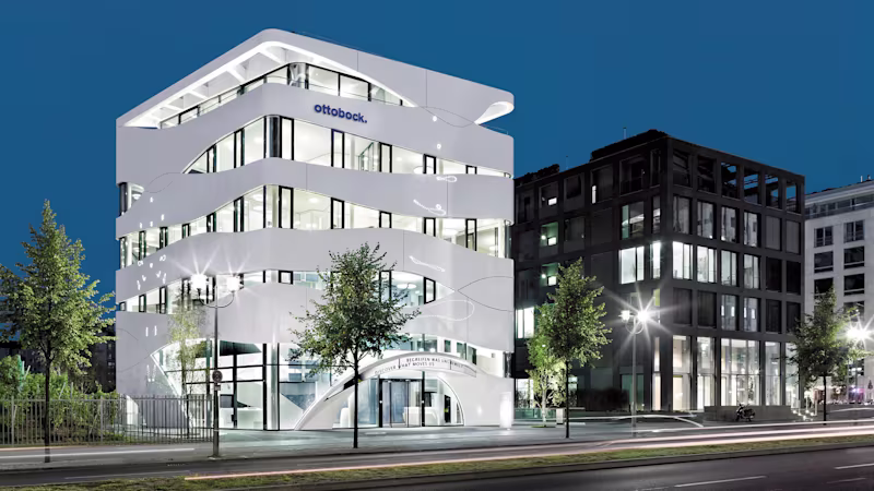 A rendering of a nice office building with the Ottobock logo