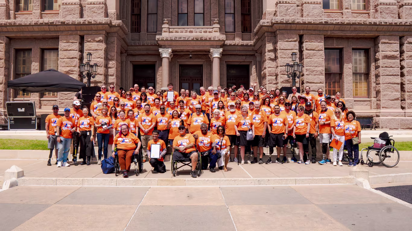 A group of limb difference advocates attending the Austin, TX Capitol Hill to show support for a bill