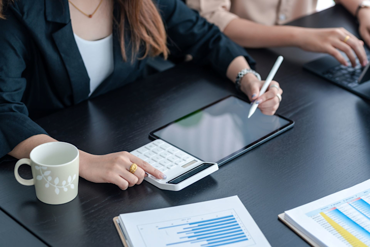 Business, calculator, 2 persons