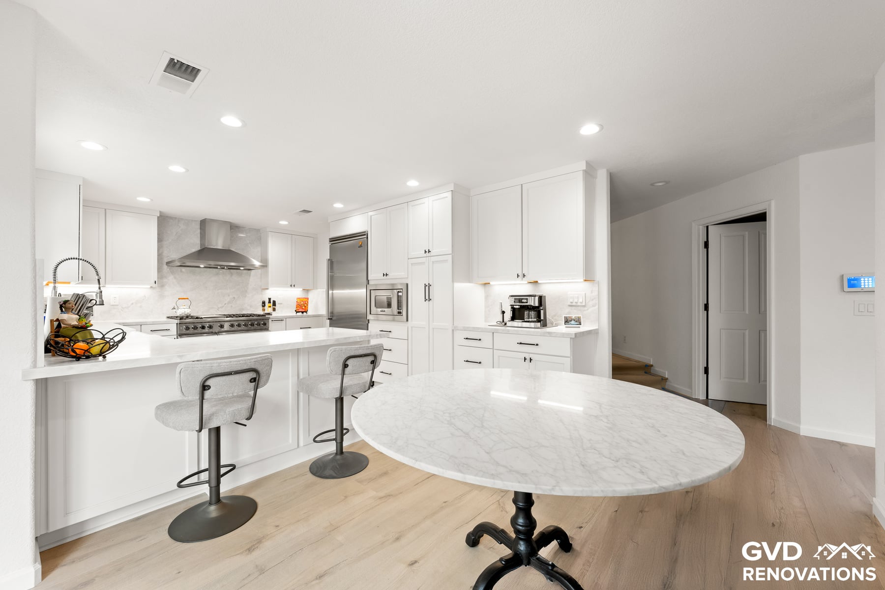 Open-Concept Kitchen Remodel with Custom Wine Cellar