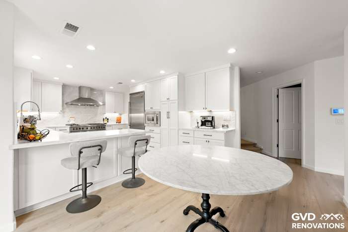 Open-Concept Kitchen Remodel with Custom Wine Cellar