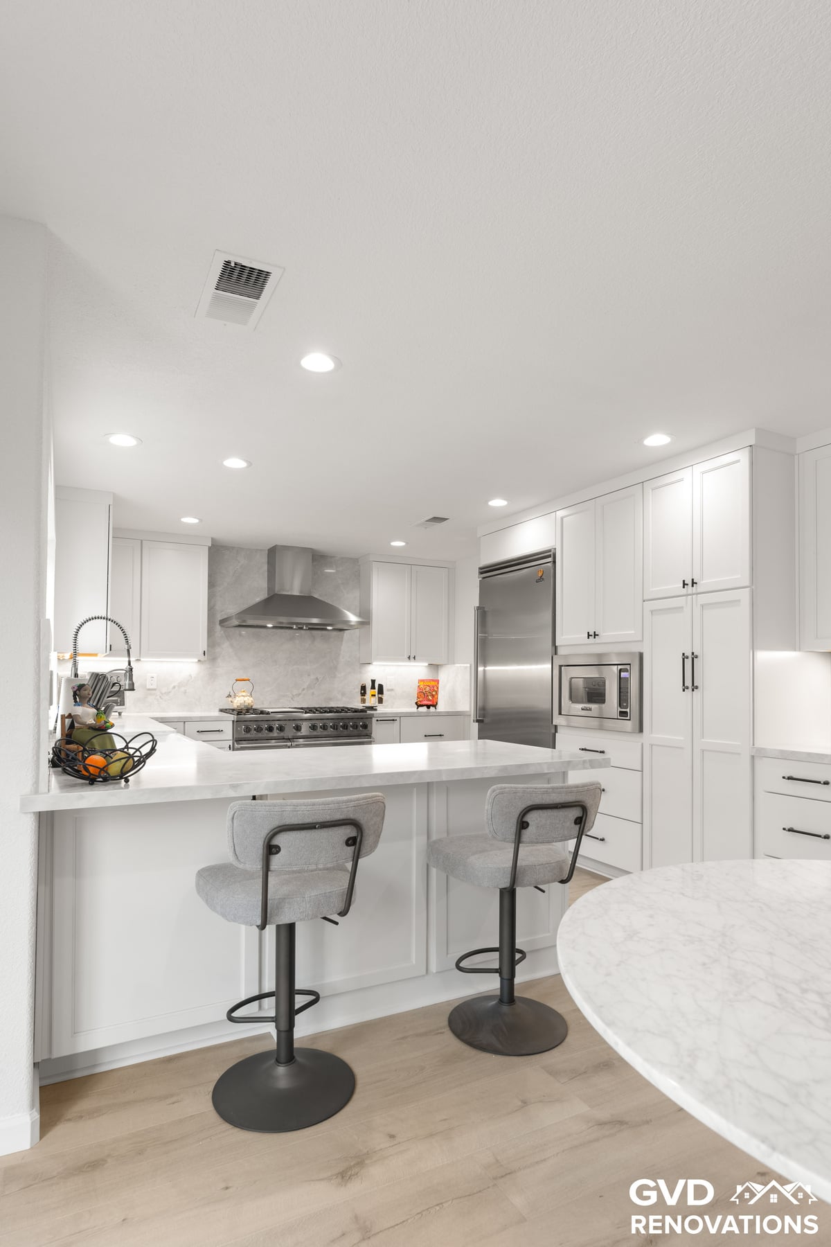 Open-Concept Kitchen Remodel with Custom Wine Cellar