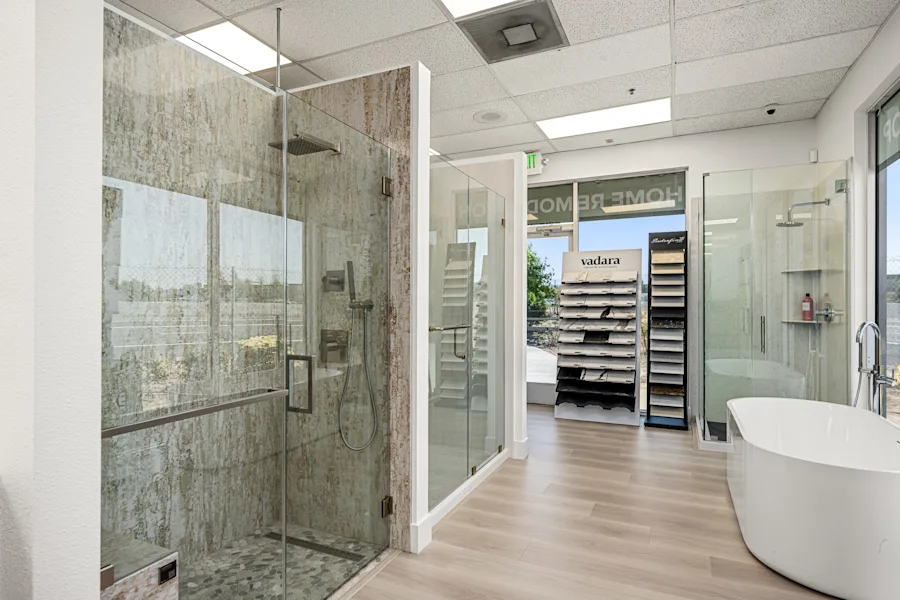 Walk-in shower and freestanding tub displays at the GVD Rocklin showroom