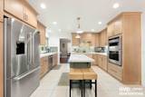 Open-Concept Kitchen Remodel with Custom Island in Rescue