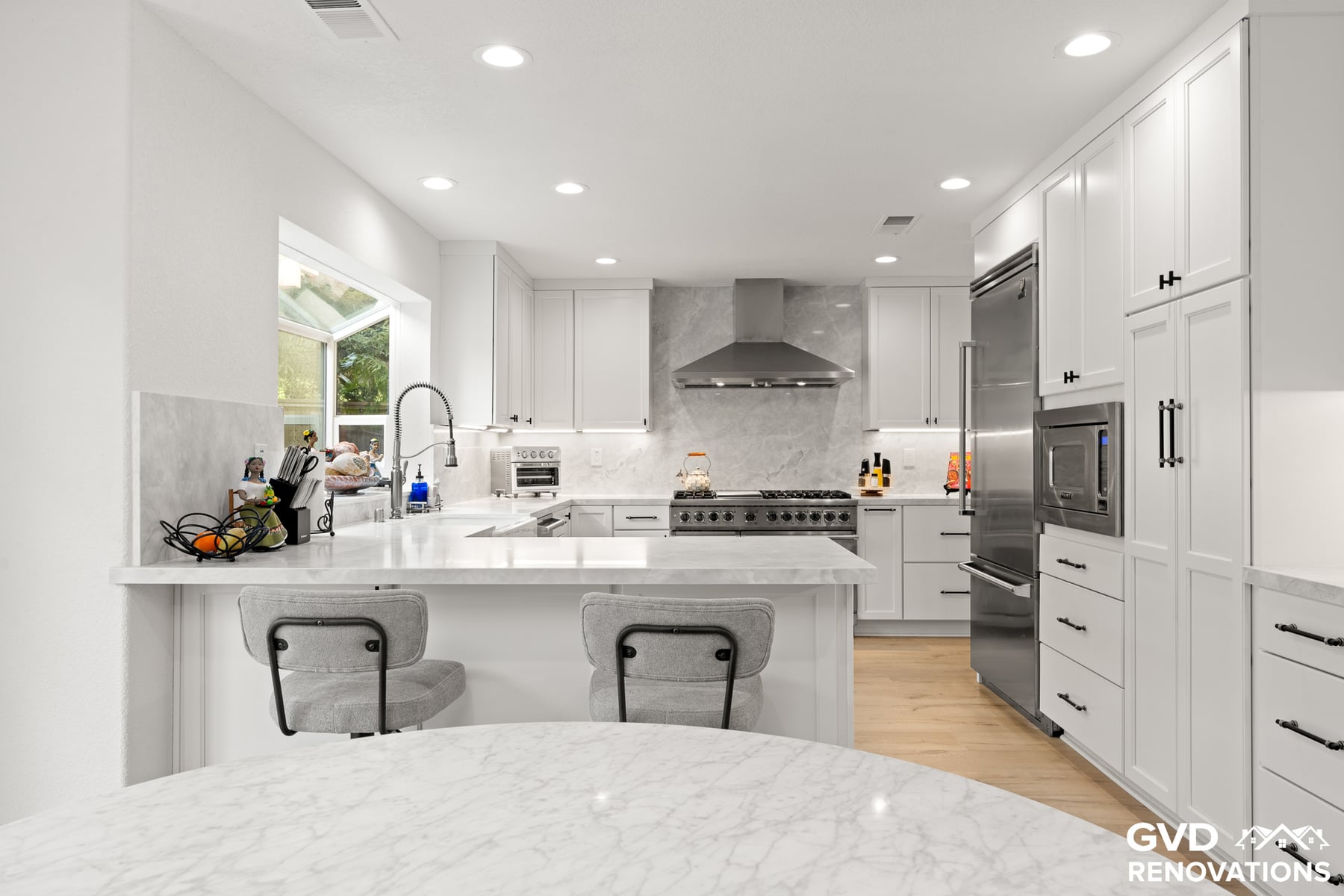 Open-Concept Kitchen Remodel with Custom Wine Cellar