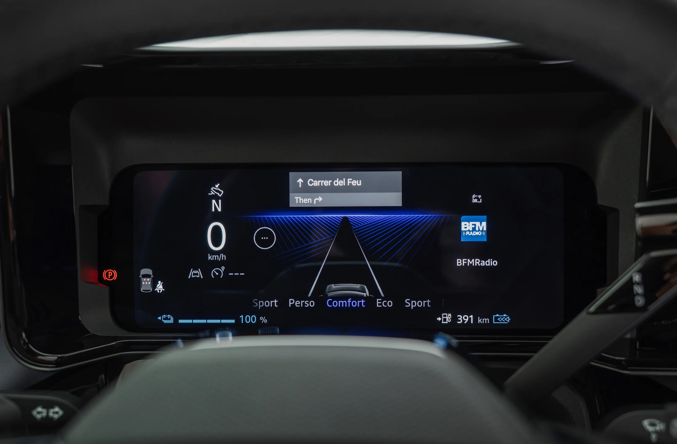 detailed view of Combimeter behind steering wheel