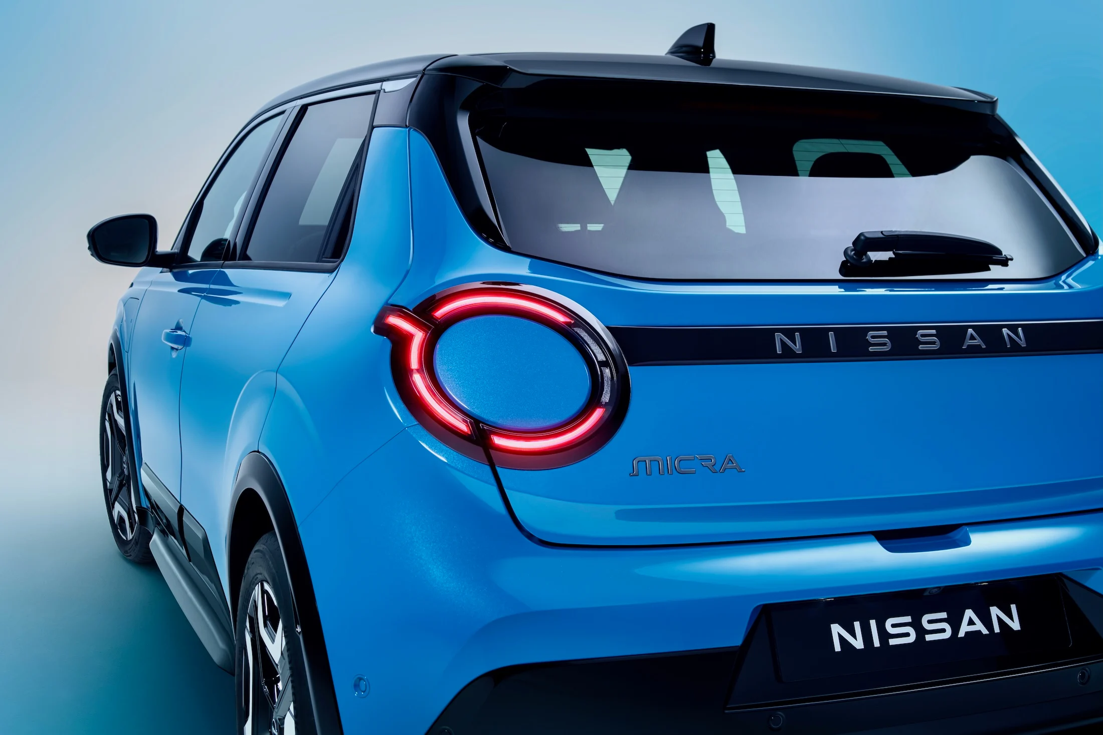 Nissan name plates, side doors and gelato scoop from rear to front