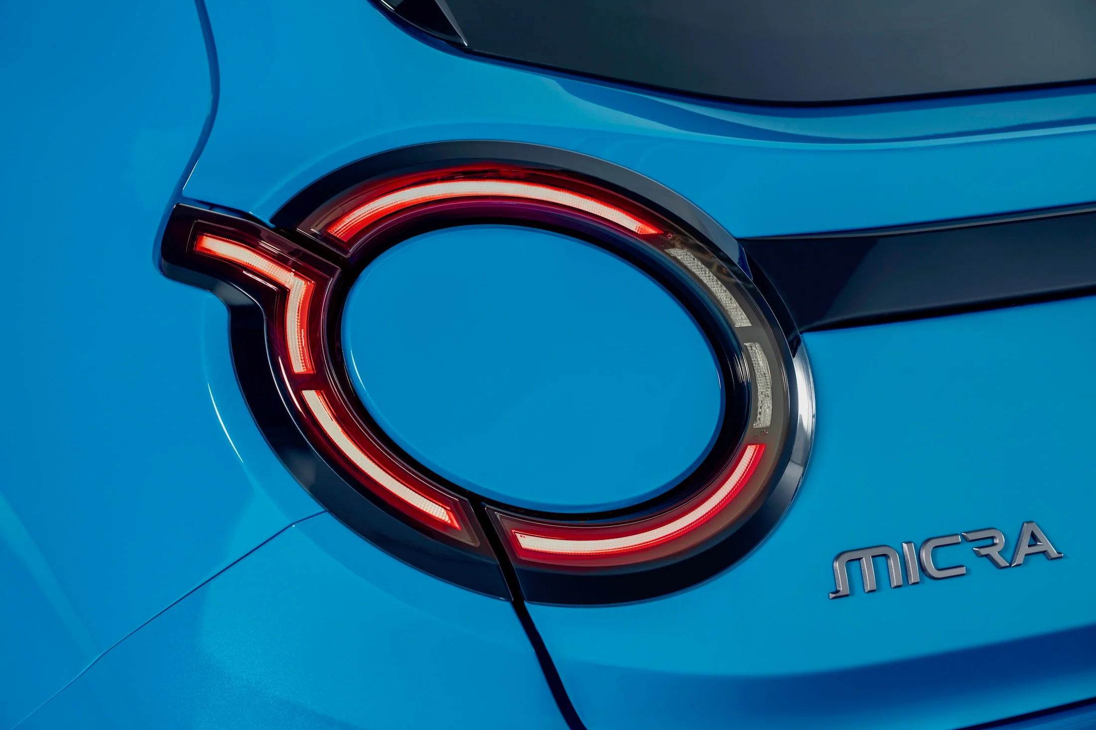 Detailed image of micra badge