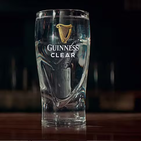 arafed shot of a glass of guinness beer on a bar