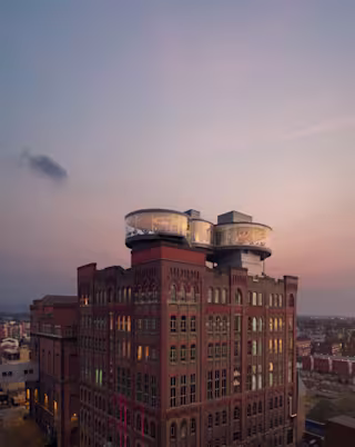 Guinness Storehouse Side by Side building on sunset background