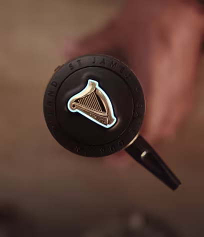 Top-down shot of the illuminated harp on a Nitrosurge pouring device