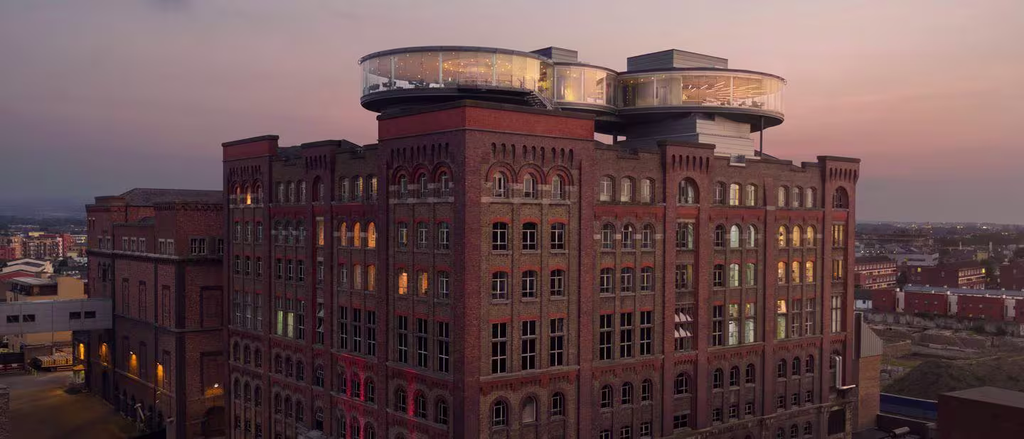 there is a large building with a clock on top of it