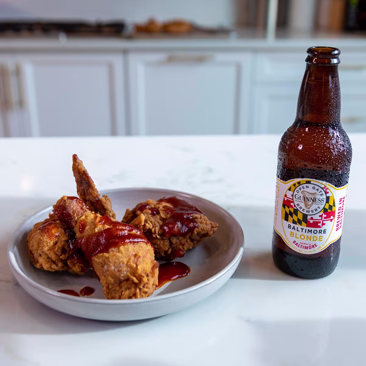 there is a chocolate cake with chocolate frosting and a raspberry on top