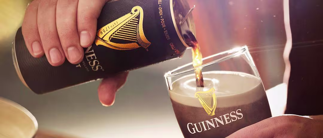 Guinness Draught in a Can poured into the glass - Hero size