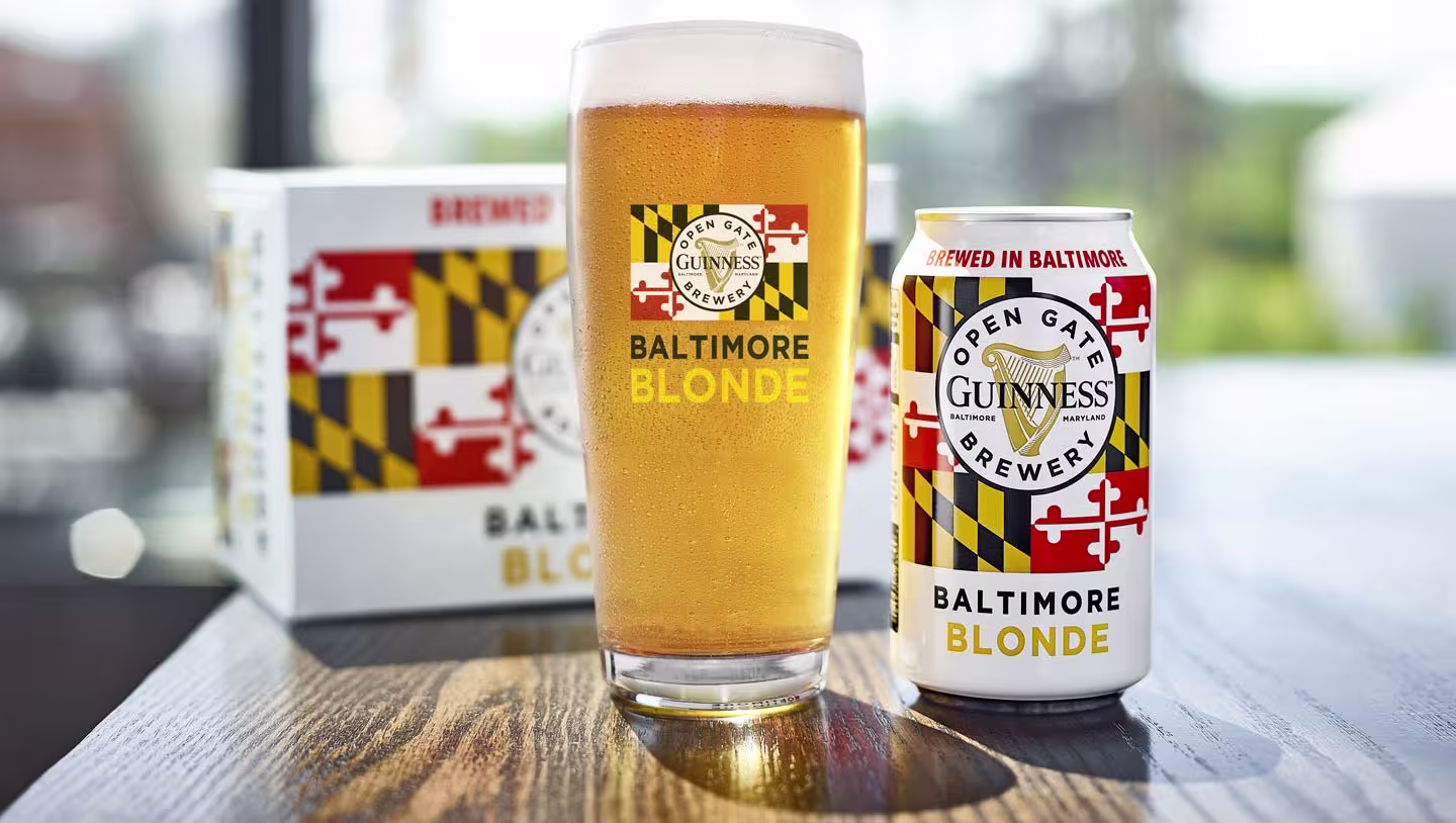 there is a beer and a can sitting on a table