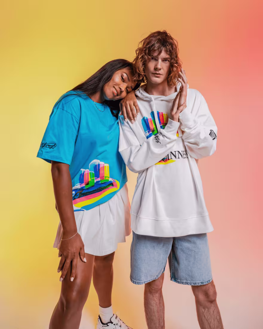Image with 2 people dressed in Guinness clothes