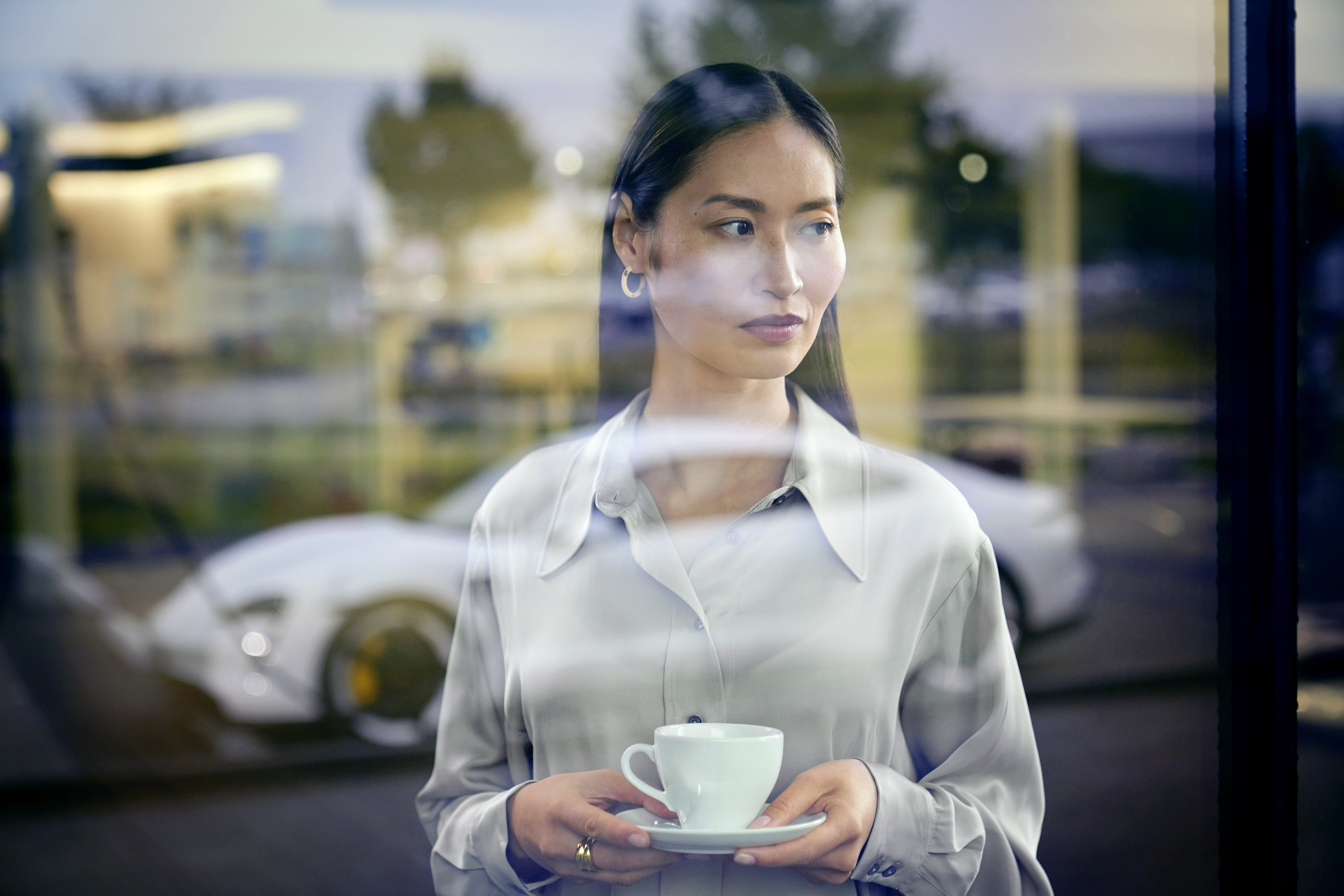 Woman holding a coffee cup