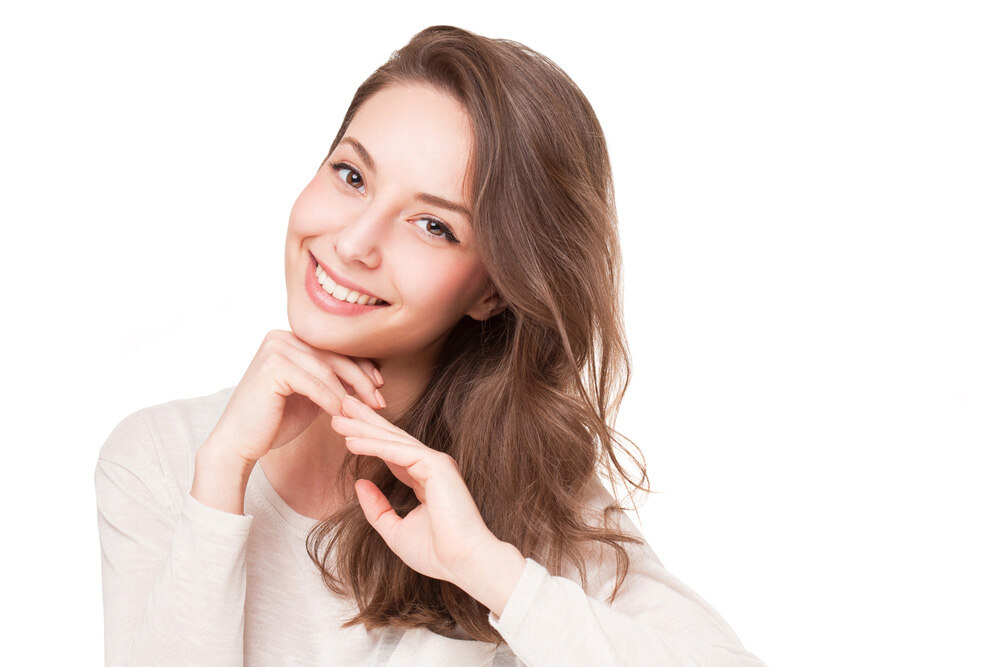 young woman with beautiful light brown hair smiling