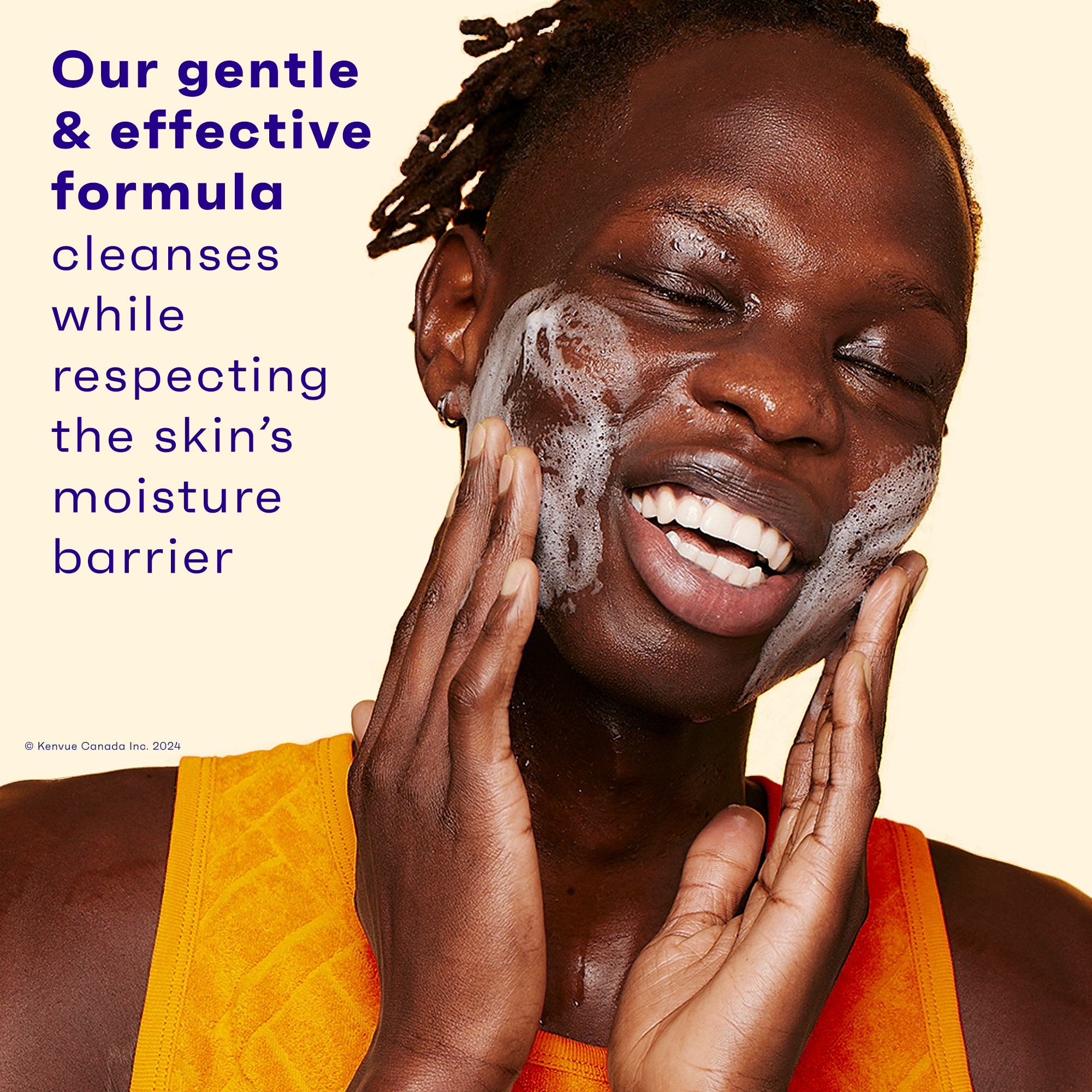 Happy young black woman washing her face with CLEAN & CLEAR® MORNING BURST® Facial Cleanser