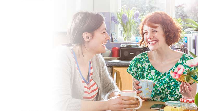 Women talking and laughing