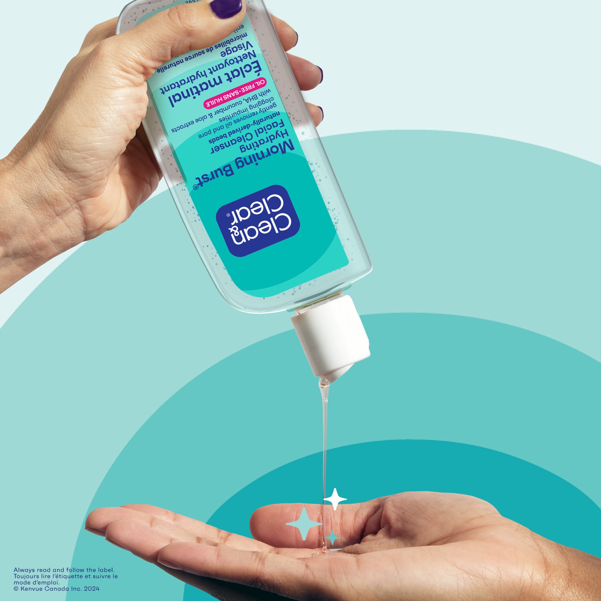 A hand is holding a bottle of Clean & Clear® Morning Burst Oil-Free Facial Cleanser bottle and squeezing some of the product into the palm