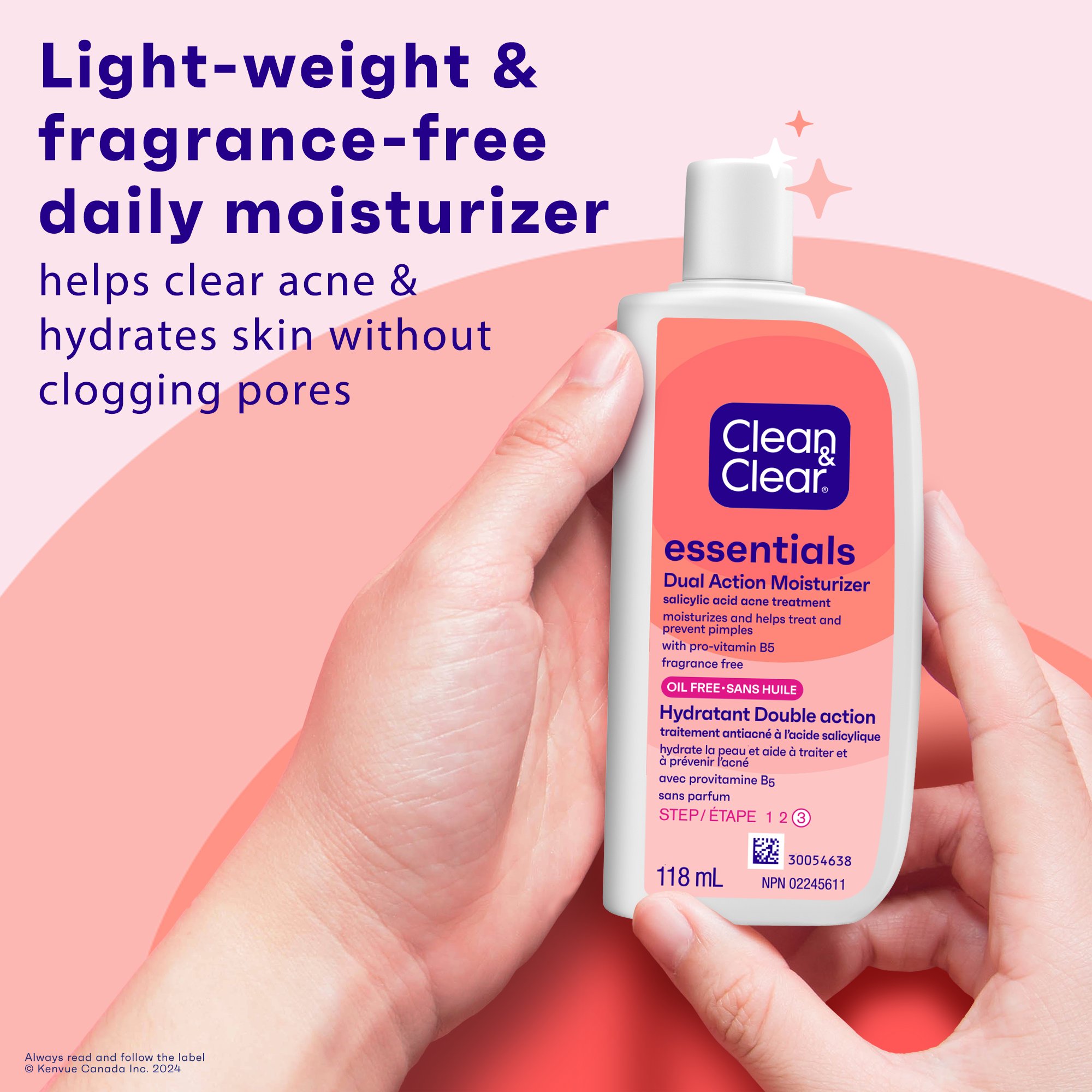 2 hands holding Clean & Clear Essentials® Dual Action Moisturizer bottle