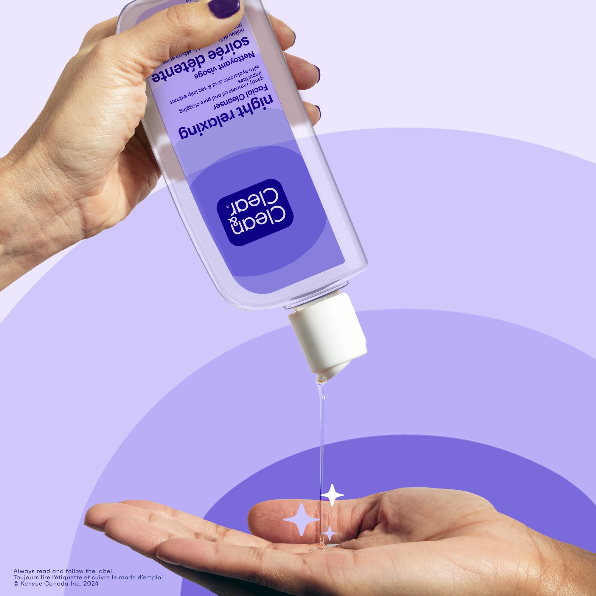 A hand is holding a bottle of Clean and Clear® Night Relaxing® Facial Cleanser bottle and squeezing some of the product into the palm