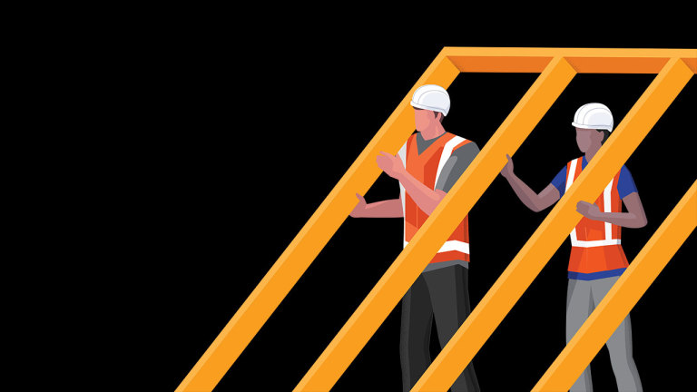 Graphic of construction workers setting up a wooden wall